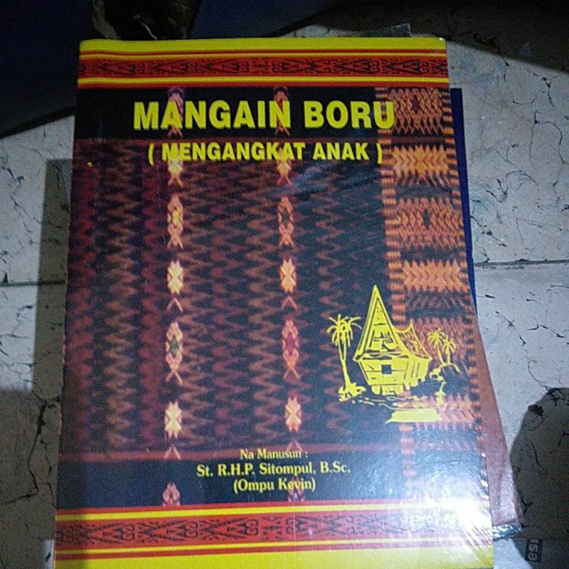 Buku mangain boru mengangkat anak