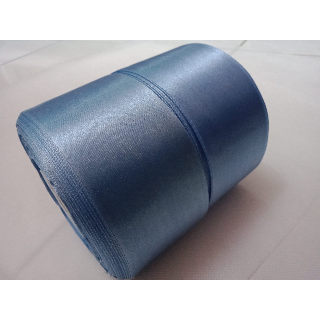 

Pita Satin / Pita Kado Biru Laut 2inch / 5 cm per Roll