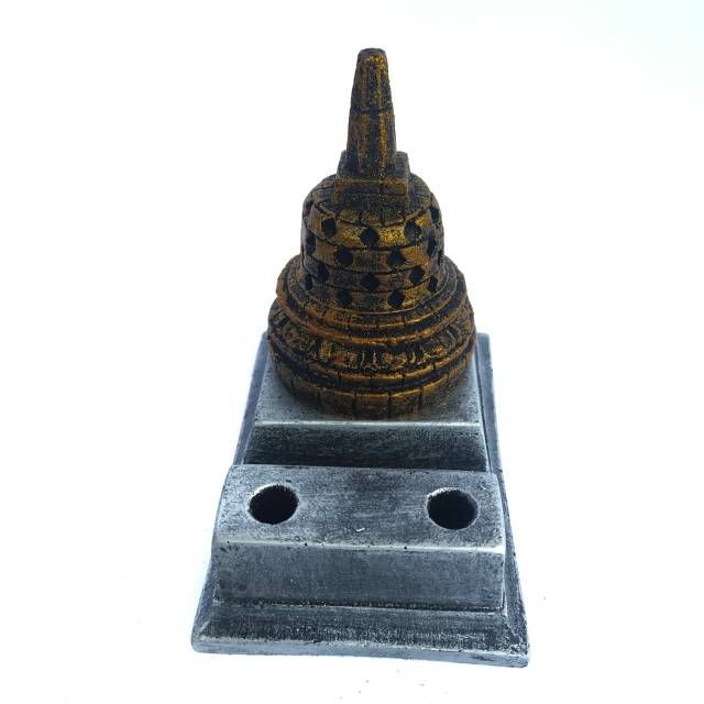 

PAJANGAN TEMPAT BOLPOIN DAN PENSIL BENTUK STUPA CANDI BOROBUDUR - PERLENGKAPAN KANTOR