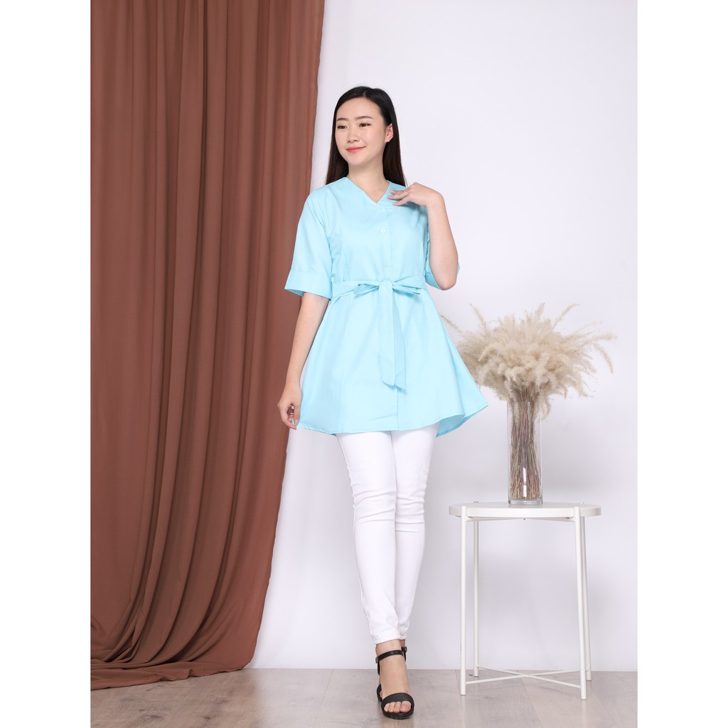 

Hot item - Blus biru pita wanita