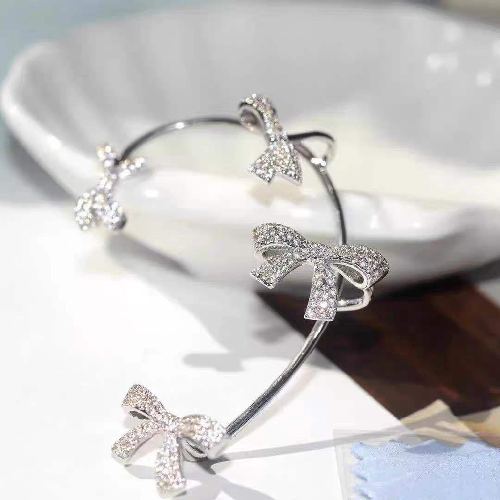 Anting Tusuk Gantung Bahan Metal Desain Pita Hias Zircon Gaya Korea Untuk Wanita