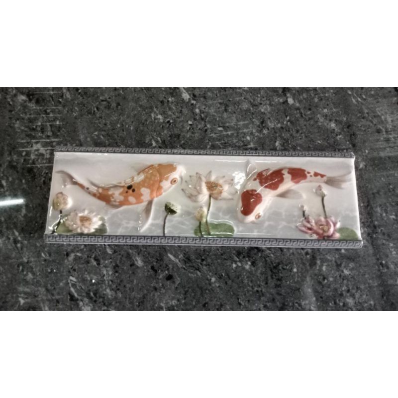 Lis keramik motif ikan timbul IMPORT (1 dus)