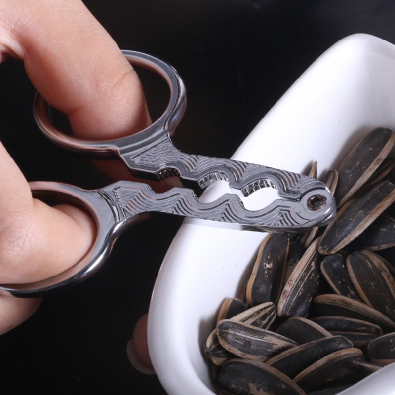 Multifungsi New Melon Seed Plier Gunting Nut Cracker Klip Penjepit Shucker Walnut Pine Sheller Opener Untuk Siku