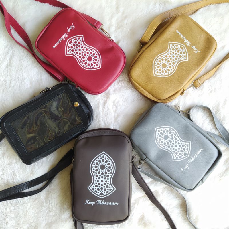 SLING PHONE CASE TEROMPAH by hana gallery