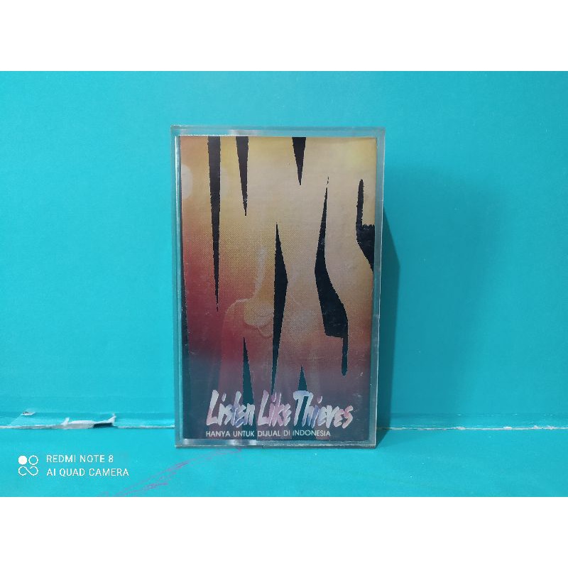 Kaset Pita : INXS - LISTEN LIKE THIEVES.