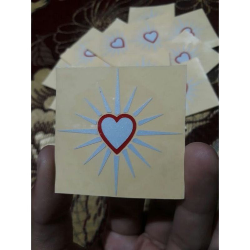 

stiker cutting stiker psht logo hati bersinar ukuran 5×5 cm