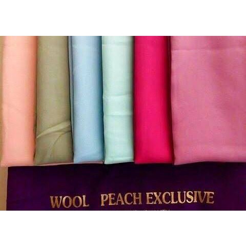 Kain Wolfis Meteran Polos Woolpeach