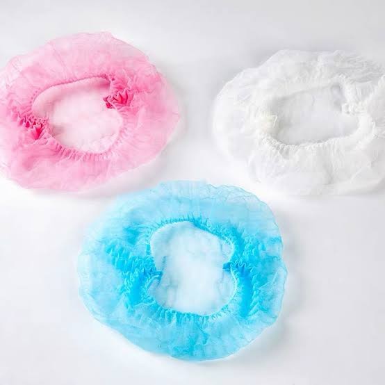 SHOWER CAP / PELINDUNG KEPALA NON WOVEN DAN PLASTIK ISI 10