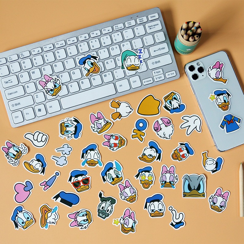 40 Donald Duck stiker lucu air kaca graffiti Jurnal bahan kartun ponsel case tangan Buku stiker Xiao