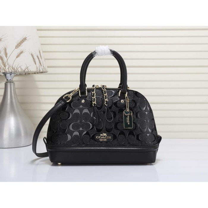 Coach's Signature Mini Crossgrain Sierra embosed
