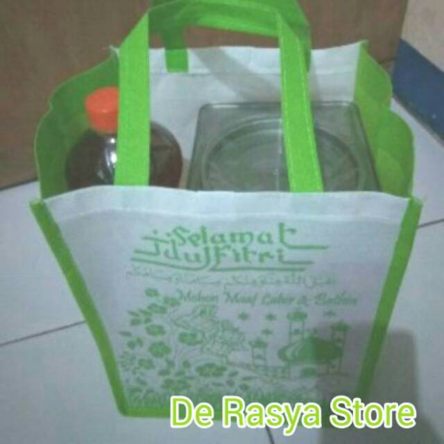 

TAS LEBARAN MUAT BISKUIT KALENG SIRUP FANTA
