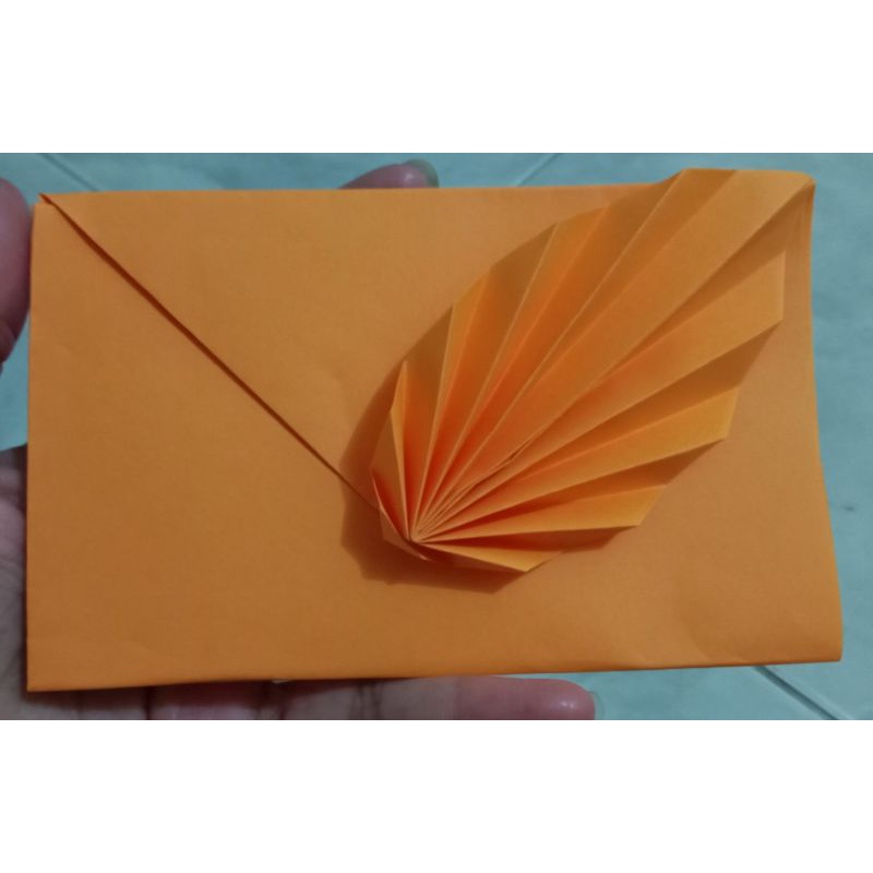 

amplop lebaran motif daun warna orange