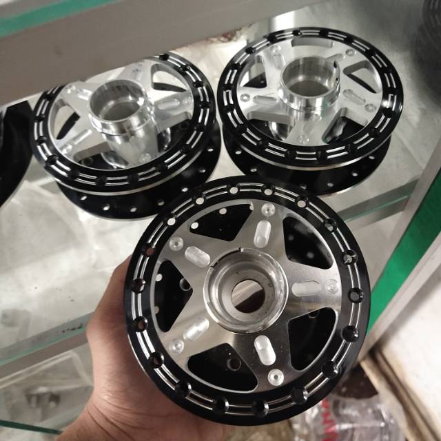 TROMOL MIO DEPAN COAK