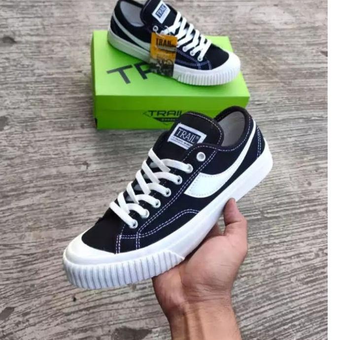 TMT.20Au22q • SEPATU SNEAKERS COMPAS LOW TRAIL  ORIGINAL BLACK WHITE