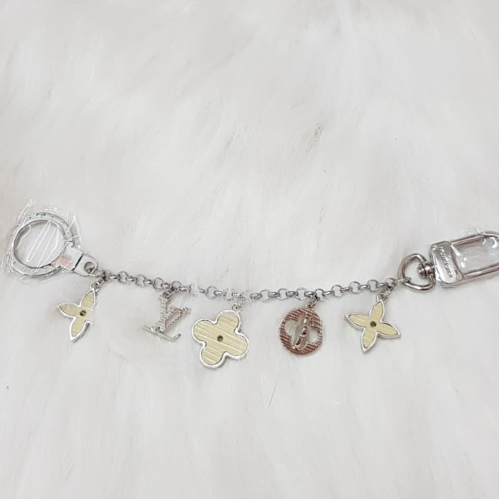 fleur de monogram long chain bag charm