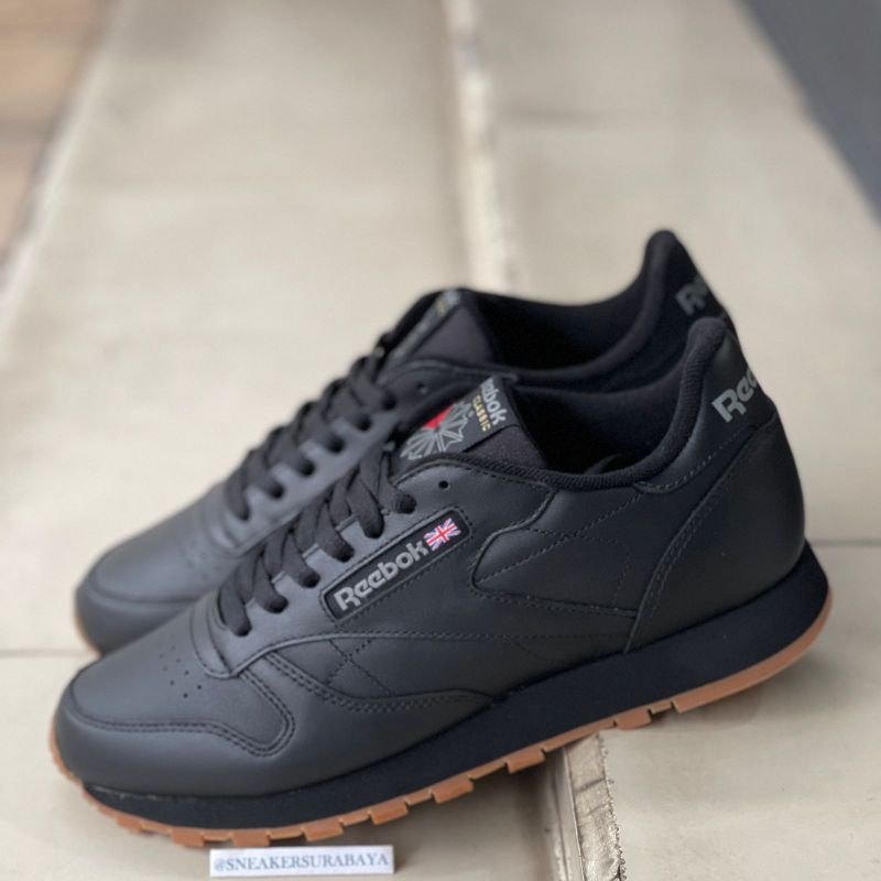 black reebok leather