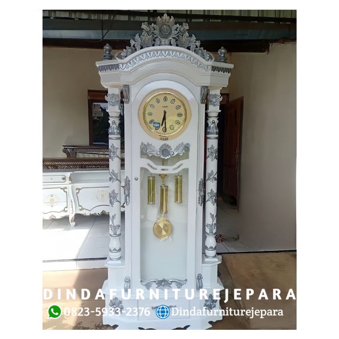 Lemari jam hias jati - lemari sudut hias - lemari jam ukir hias