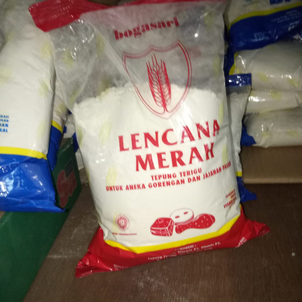

Tepung Terigu Segitiga Biru dan Terigu Lencana Merah