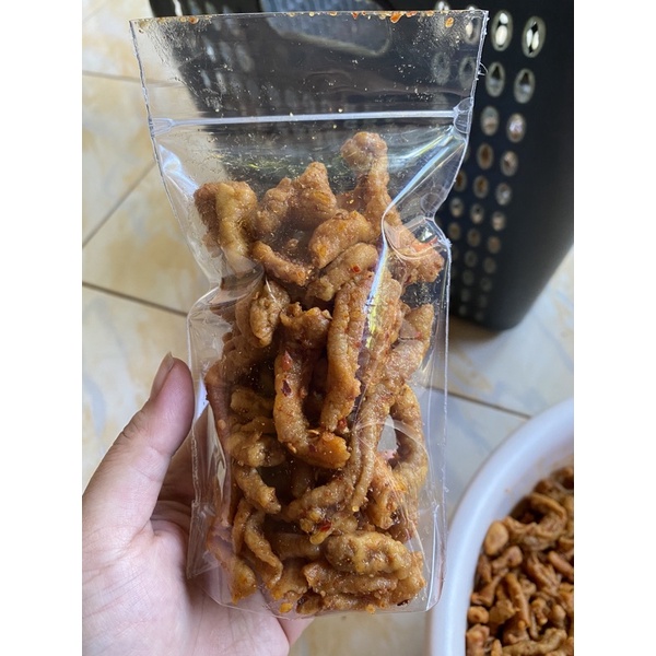 

aneka jajan repack USUS GORENG PEDAS DAUN JERUK 100 gram