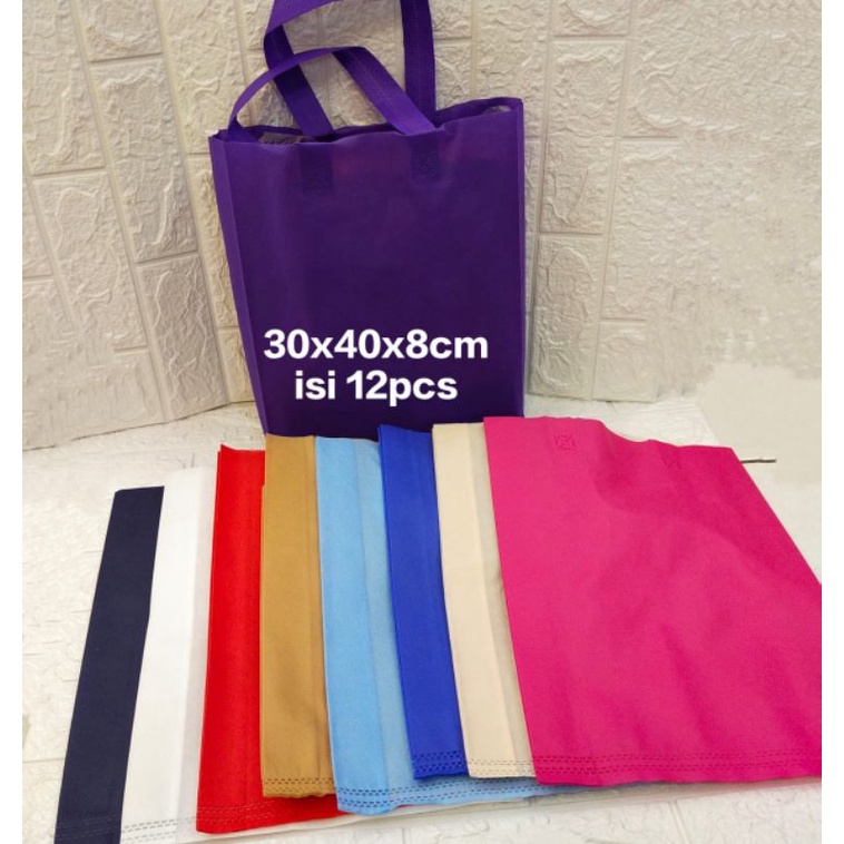 

1 Lusin isi 12 Tas Kain Spunbond / Goodie Bag Tali Ukuran 30x40 cm