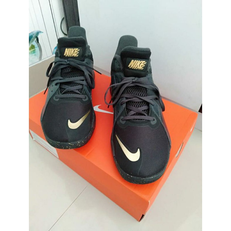 nike fly by mid black gold