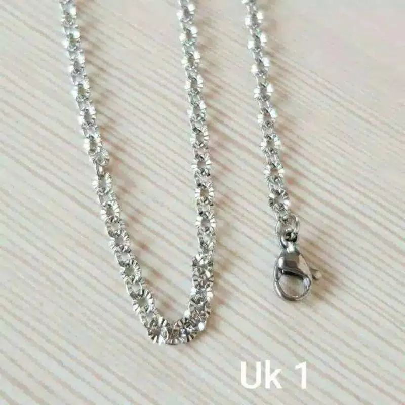 KALUNG NURI MOTIF TITANIUM SILVER-KALUNG TITANIUM MODEL NURI MOTIF WARNA SILVER PRIA WANITA