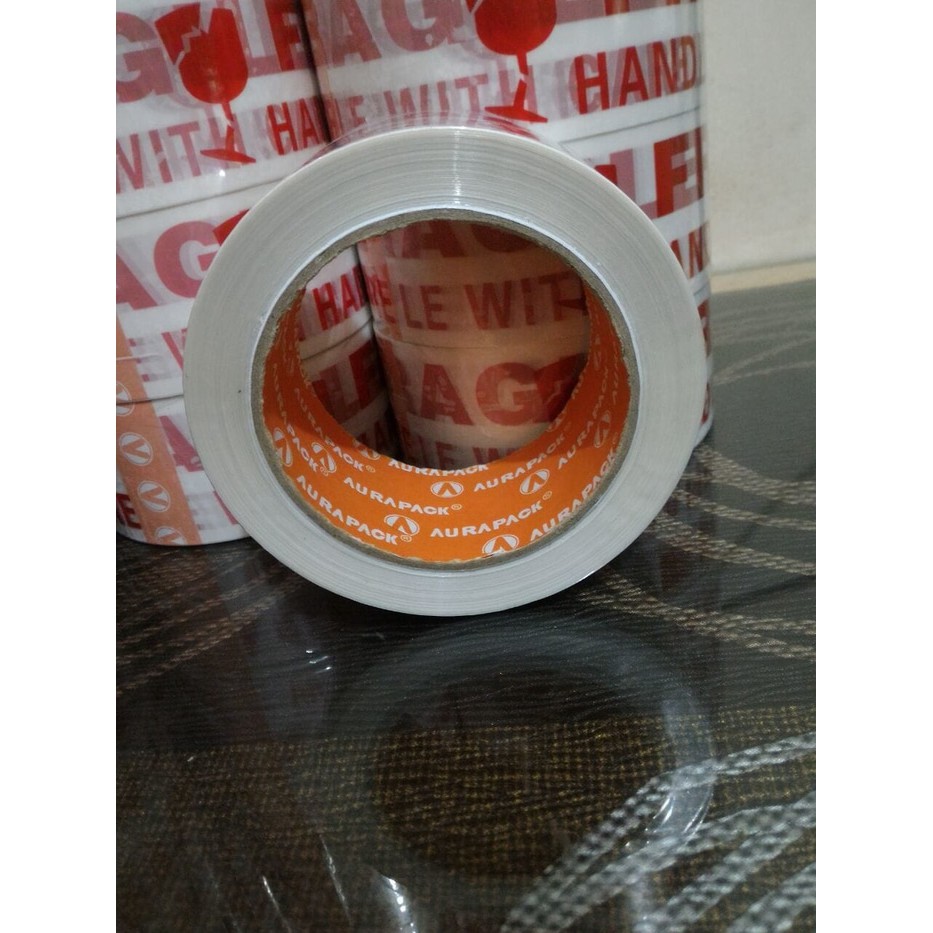 

LAKBAN FRAGILE WARNA PUTIH 1 DUS ISI 72 ROLL