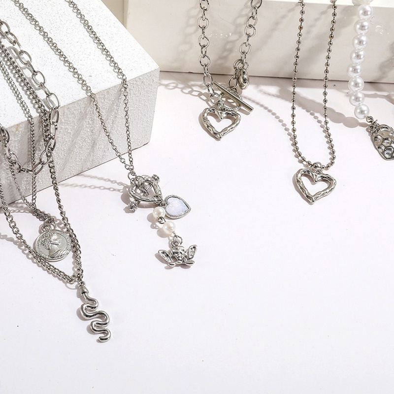 Kalung Choker Liontin Mutiara Bentuk Kupu-Kupu Hati Warna Silver Untuk Wanita