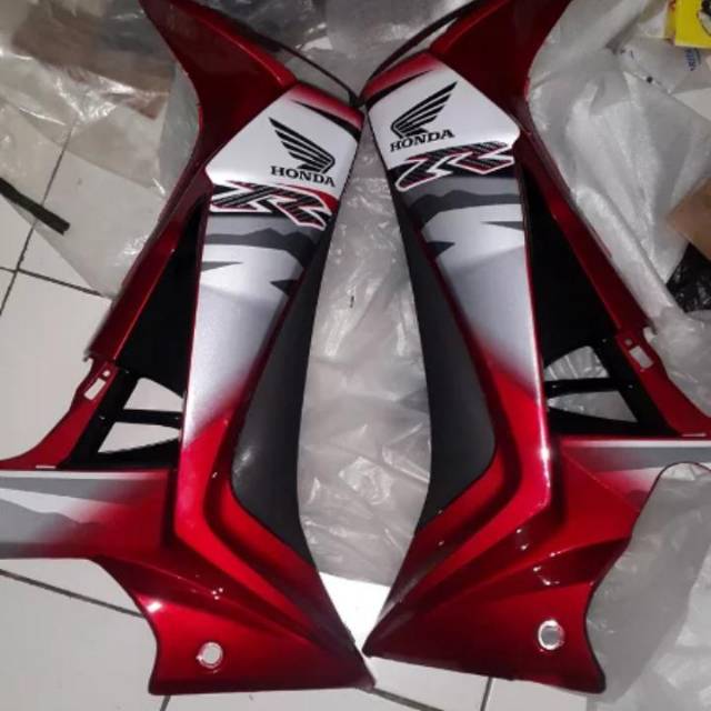 Sayap supra x125 warna merah plus setriping