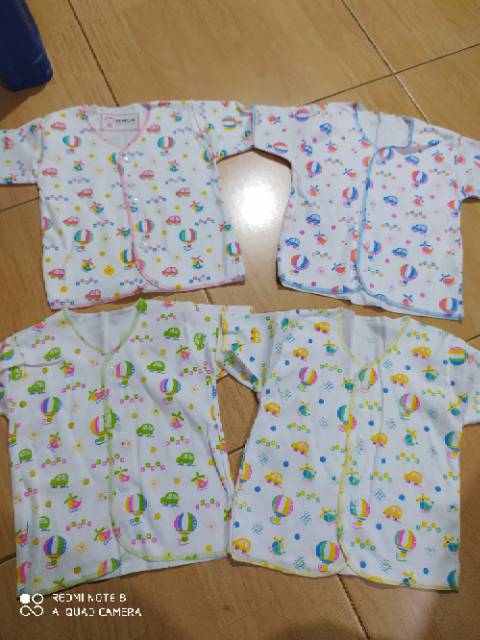 Baju bayi lengan pendek bermotif