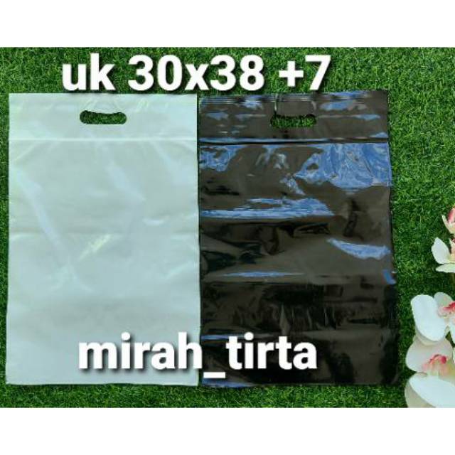 

10 LEMBAR Plastik klip plong oval 30x38 cm. Kantong ziplock online olshop putih Klip baju distro