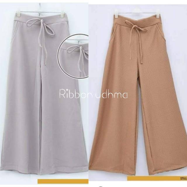 Udhma ribbon celana tali milano crep