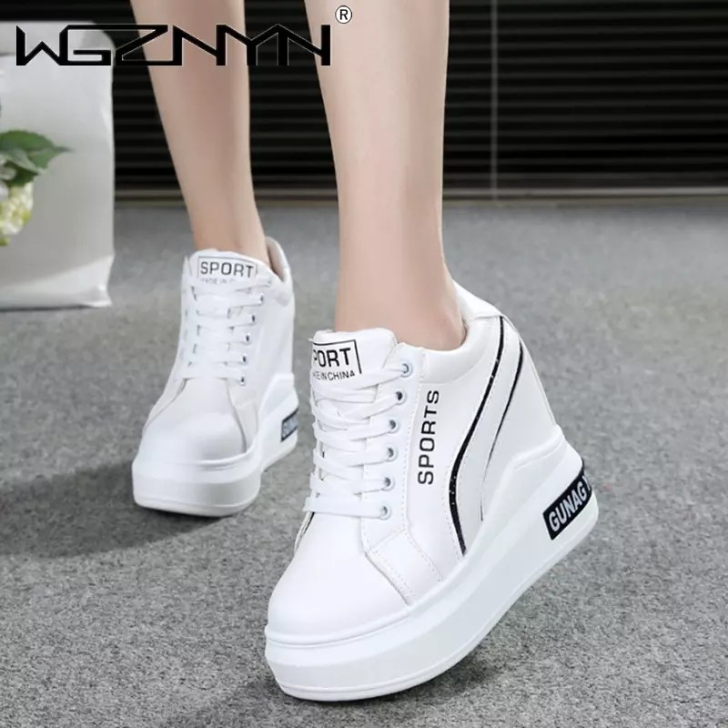 Sepatu Boots Wanita Fashion Hak Dalam Bahan Sintetis Temali HT 48