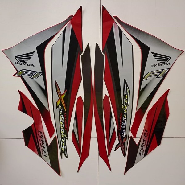 striping honda supra x 125 r helm in 2012 2013 merah
