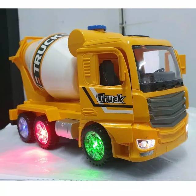 MAINAN  TRUK MOLEN BUMP AND GO MUSIK DAN LAMPU