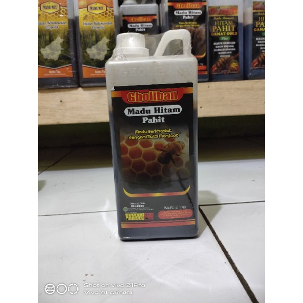 

Madu hitam pahit gholiban 1kg