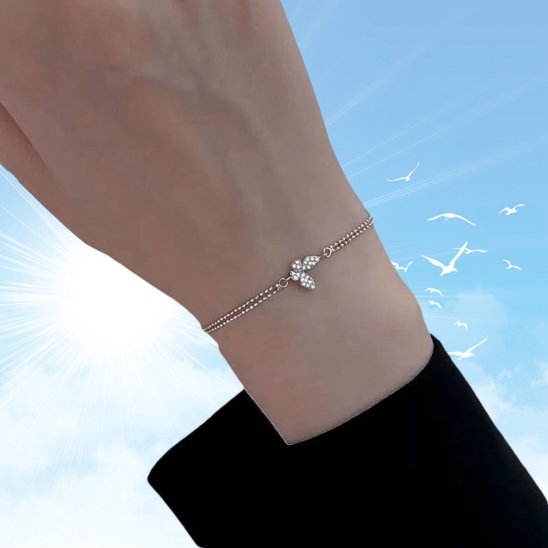 Gelang Rantai Desain Kupu-Kupu Aksen Zircon Warna Silver Anti Alergi Untuk Wanita