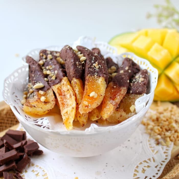 

Makanan cemilan cemilan camilan candied mango manisan mangga kering dua rasa