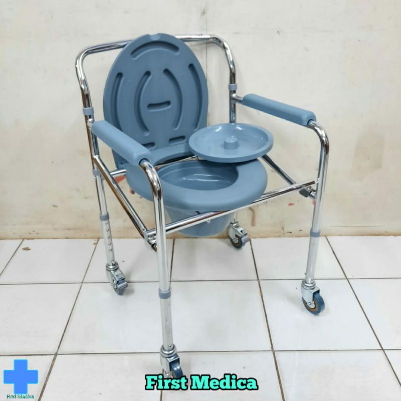 Kursi Roda BAB Dengan Roda Sella / Kursi Commode BAB Dengan Roda Sella