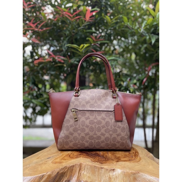 Coach Prairie sign tan rust