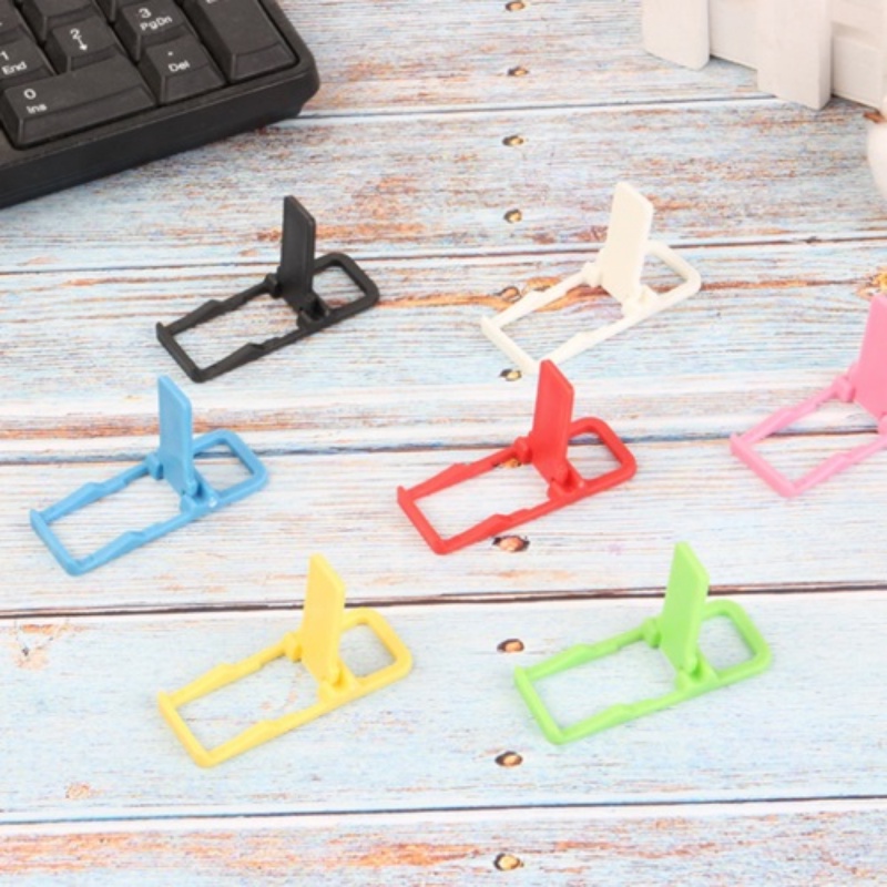 Bracket Lipat Mini Portable Universal Bahan Plastik Warna-Warni Untuk Smartphone