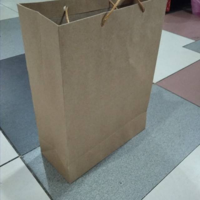 

Paper bag xl polos tali kertas terlaris dan murah isi 12 pcs