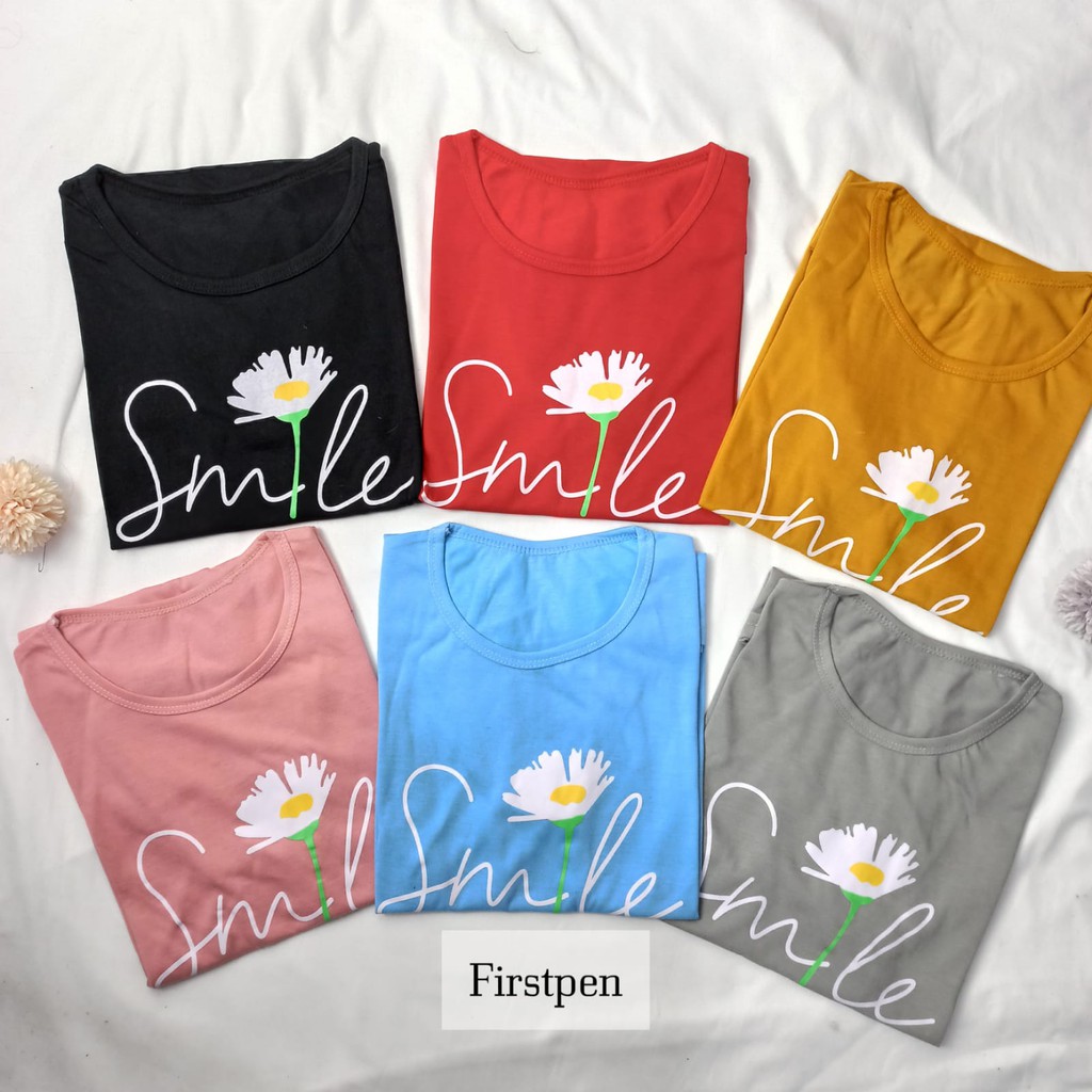 Kaos motif bunga daisy warna wanita