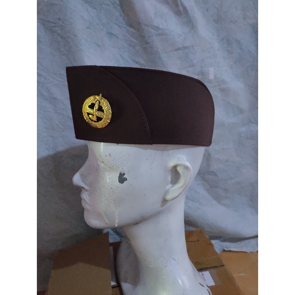 peci pembina putri pramuka