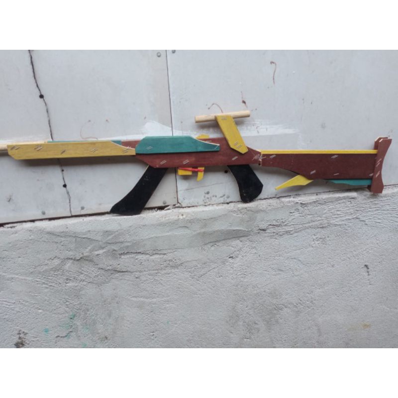 mainan tembakan kayu peluru karet awn