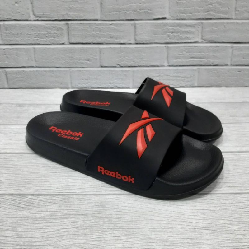 REEBOK Fasion Pria Dan Wanita Sendal Slide Berbahan Karet Ringan Dan Nyaman Digunakan Untuk Jalan