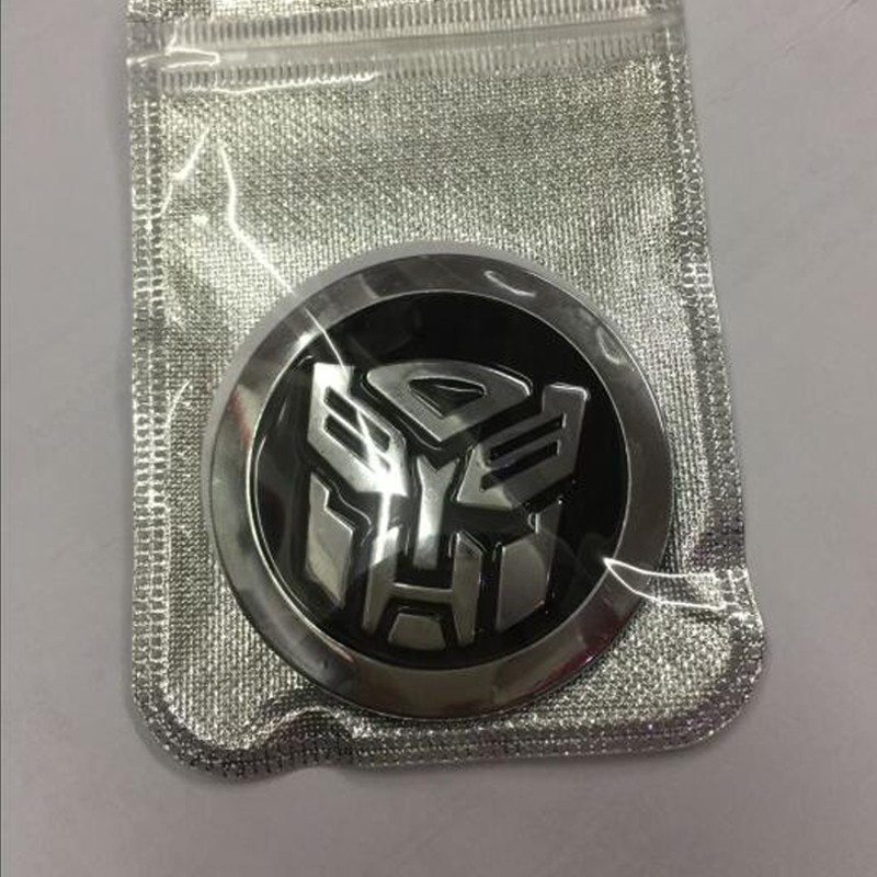 1Pc Stiker Emblem / Badge Metal 3D 65mm Transformer Autobot Warna Hitam Untuk Mobil / Truk