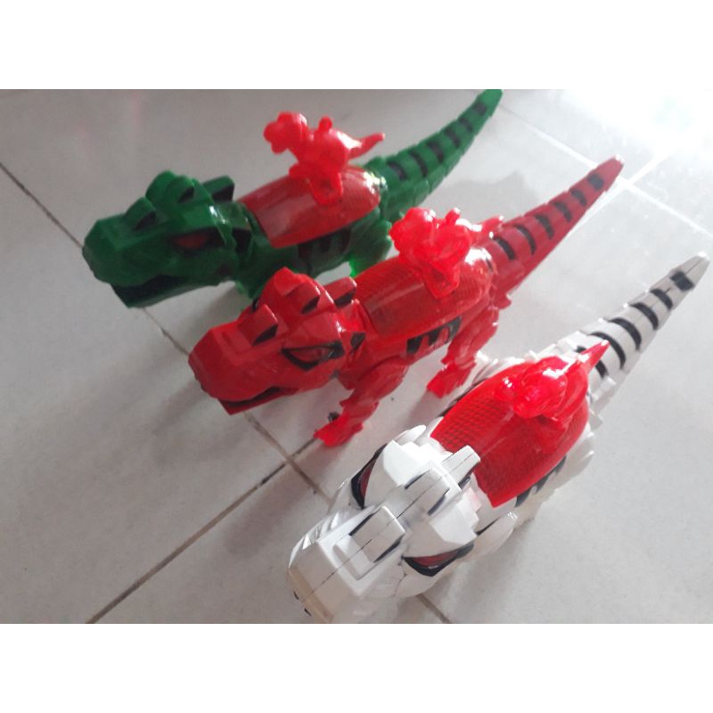 mainan dinosaurus bisa jalan ada musiknya