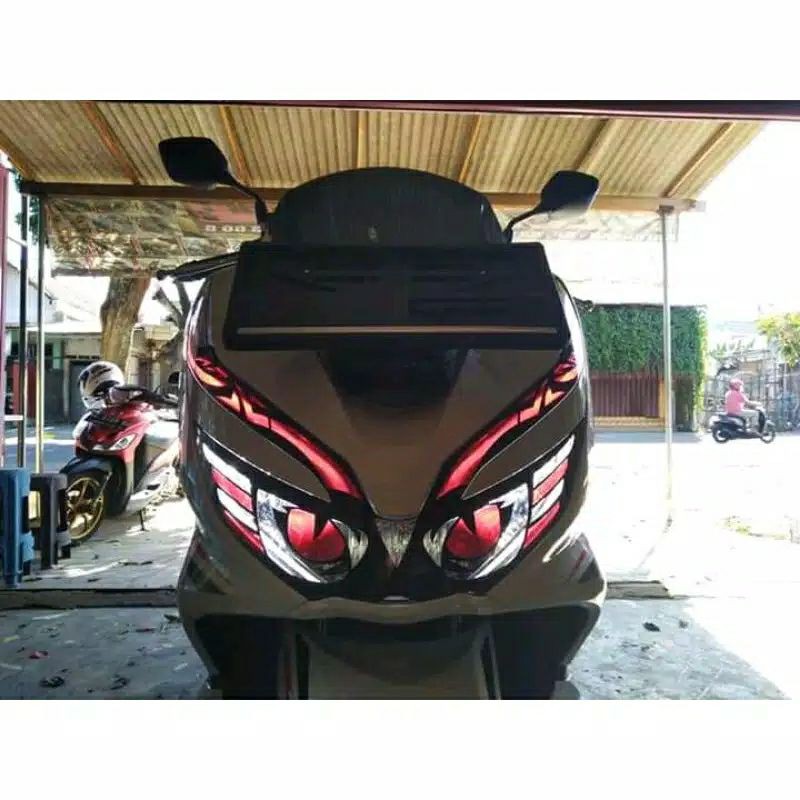 STIKER LAMPU PCX MATA KUCING