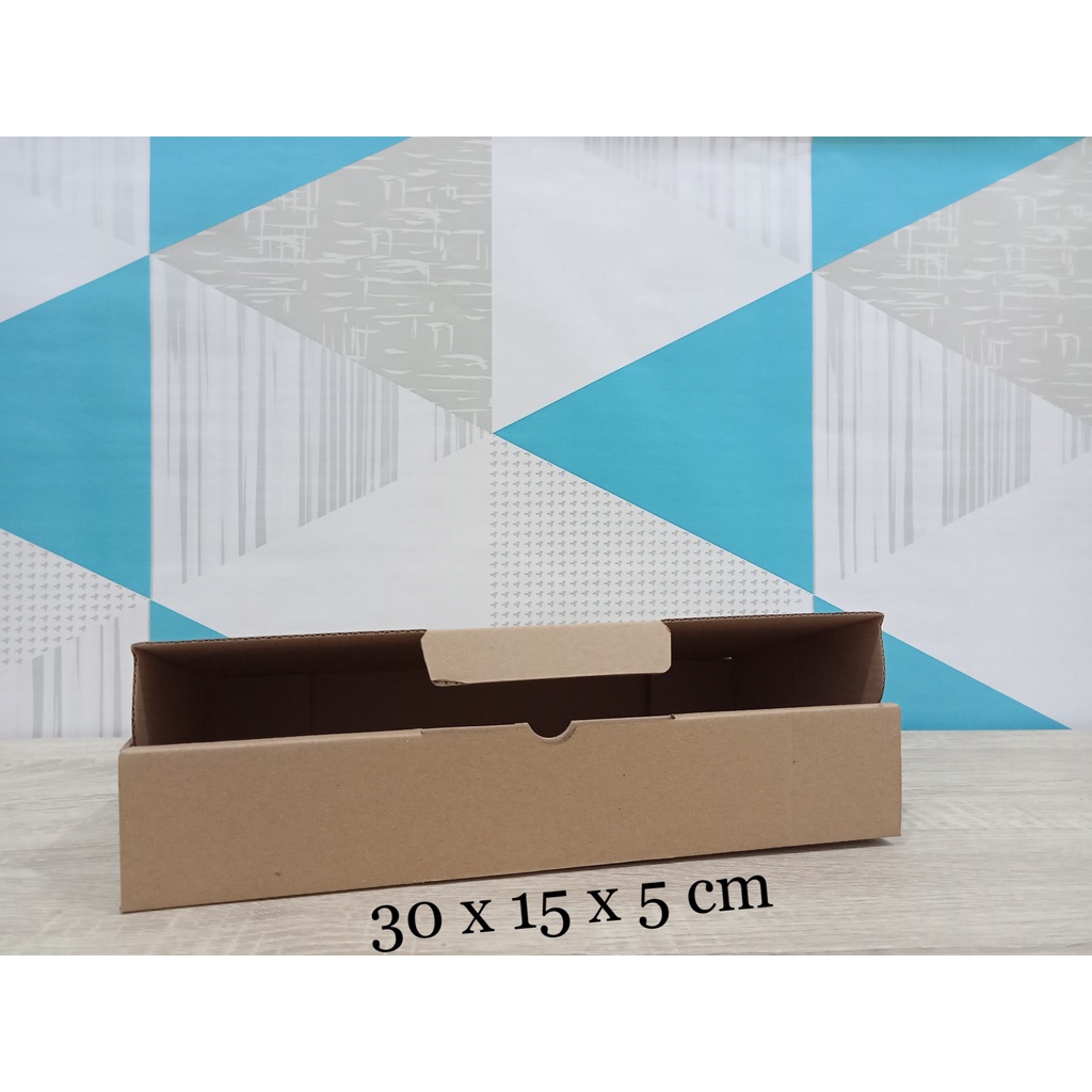 

Kardus 30 x 15 x 5 cm....Die Cut kotak aksesoris dll